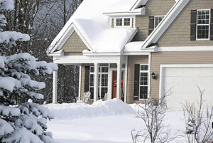 Snow in front yard of house