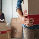buyers unpacking moving boxes