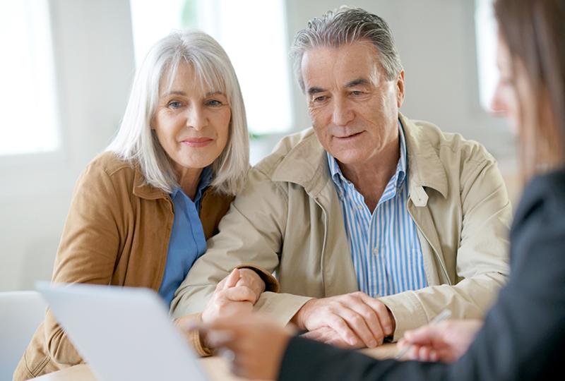 Couple learning about buying a condo