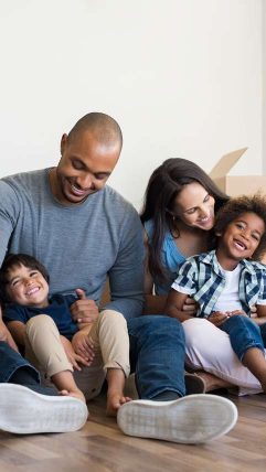 Latino seller family and moving boxes